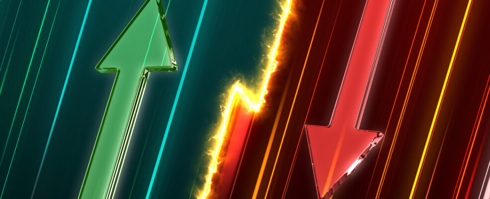 A graphic illustrating two arrows going up and down. The one going up is green and the one going down is red.